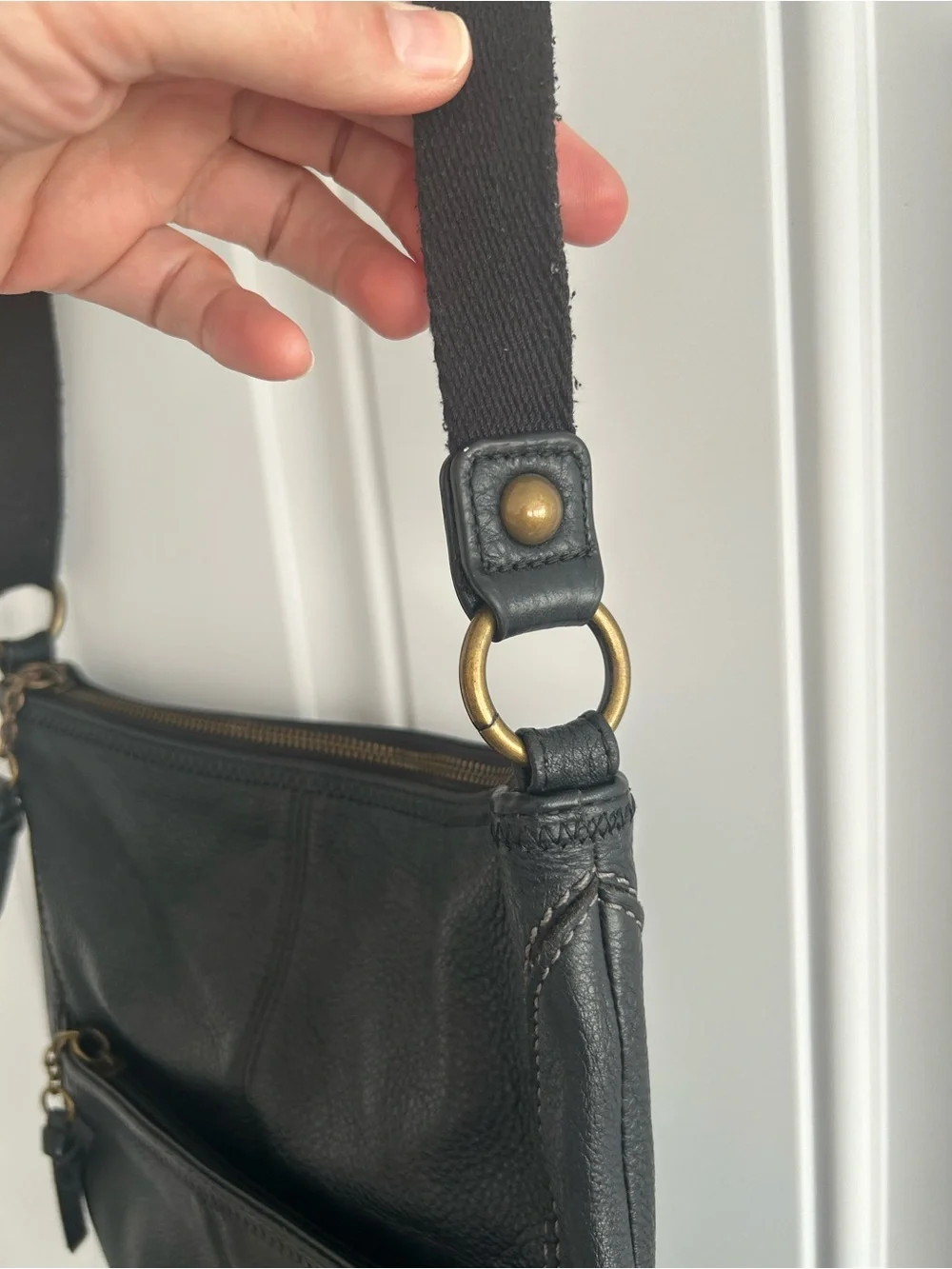 The Sac Iris Black Pebbled Leather Crossbody Bag Adjustable Strap Brass Hardware